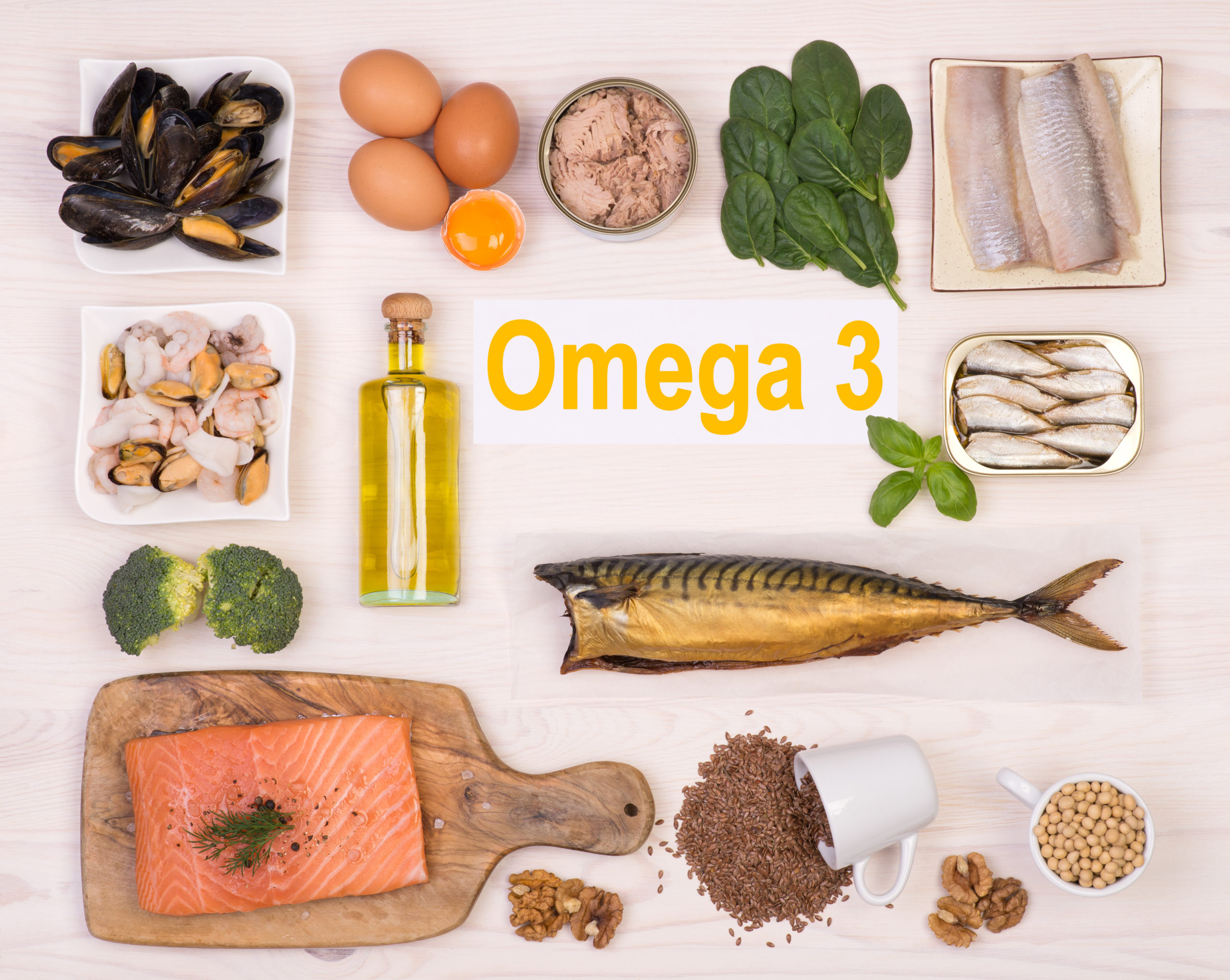 Omega 3 Foods including salmon sardines eggs dark leafy greens oily fish